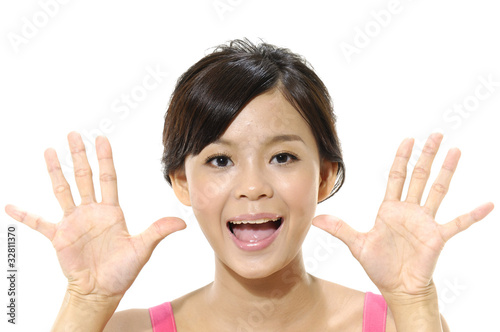 Young happy woman stretching up hands