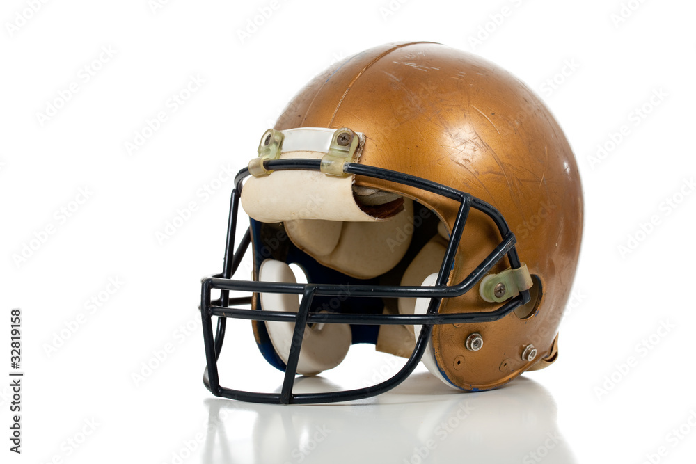 Gold football helmet on a white background Gold football helmet on a white background