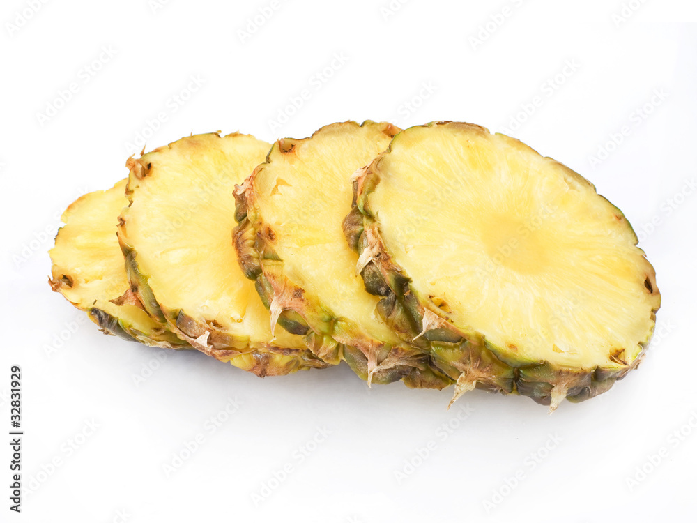 Ripe half pineapple with lush green leaves Ripe half pineapple with lush green leaves