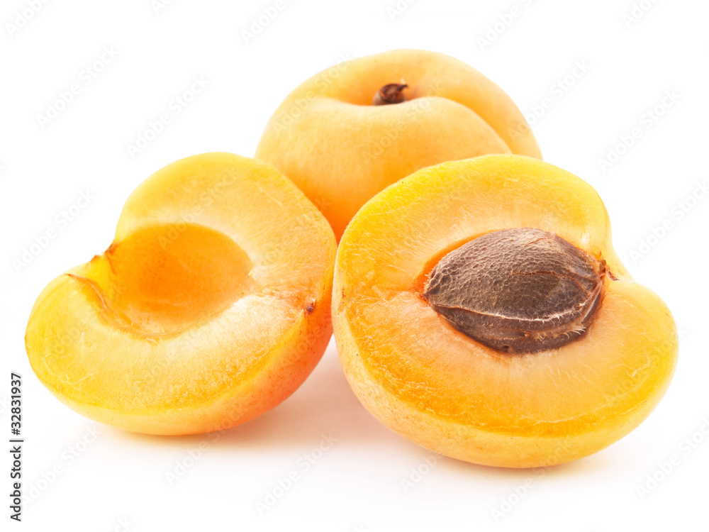 Apricot fruits with leaves isolated on white background Apricot fruits with leaves isolated on white background