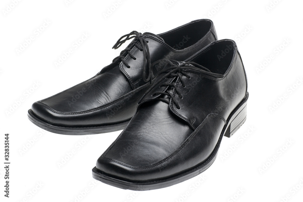 pair of man's black shoes