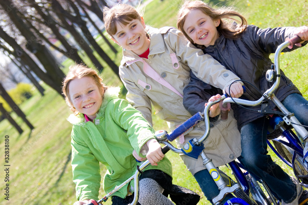 Fototapeta premium Girls on bicycles