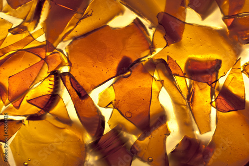 Amber glass fragments set in resin photo