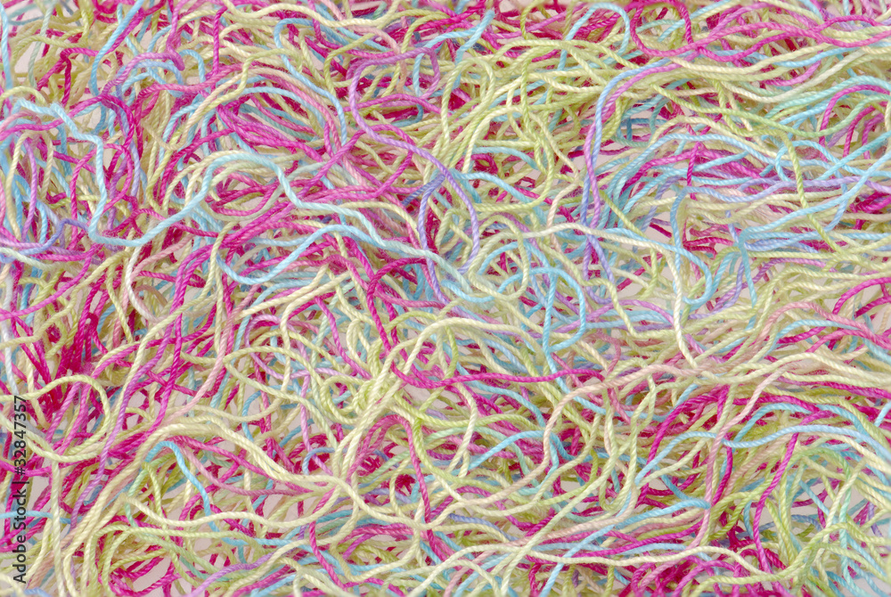 closeup bacground of multicolored threads