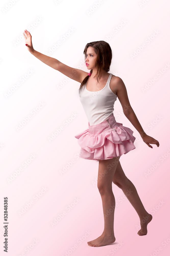 Beautiful woman in pink skirt, dancing Beautiful woman in pink skirt, dancing