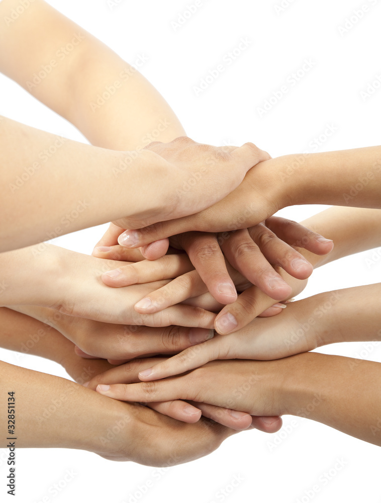 group of young people's hands together group of young people's hands together