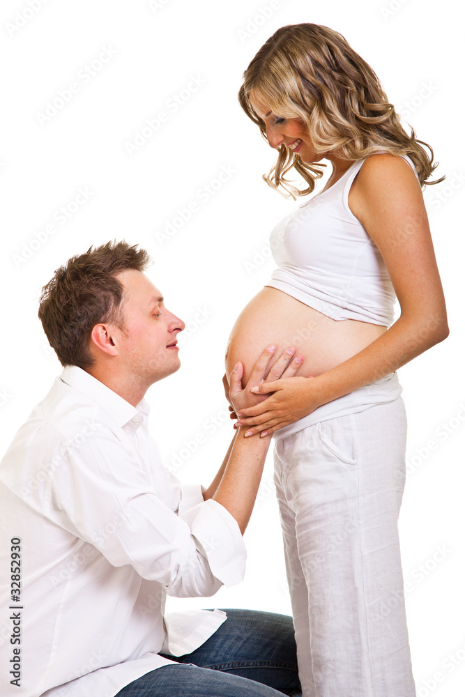Pregnant woman with man isolated on white