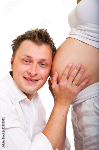 Pregnant woman with man isolated on white