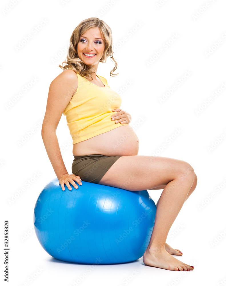 Pregnant woman with gymnastic ball isolated on white Pregnant woman with gymnastic ball isolated on white