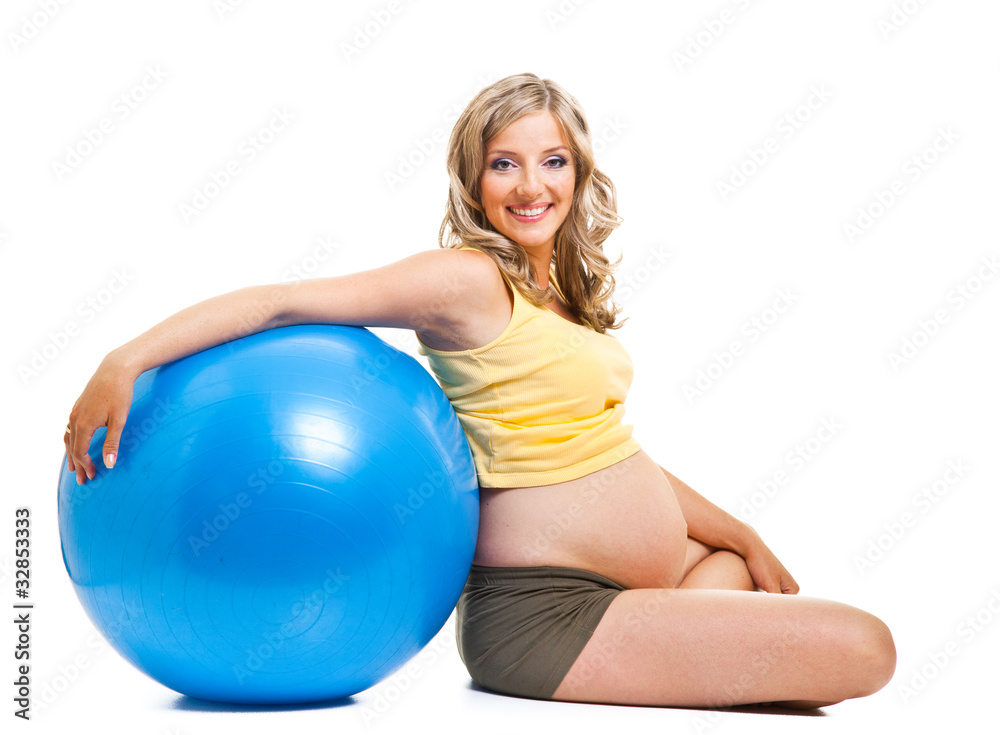 Pregnant woman with gymnastic ball isolated on white Pregnant woman with gymnastic ball isolated on white
