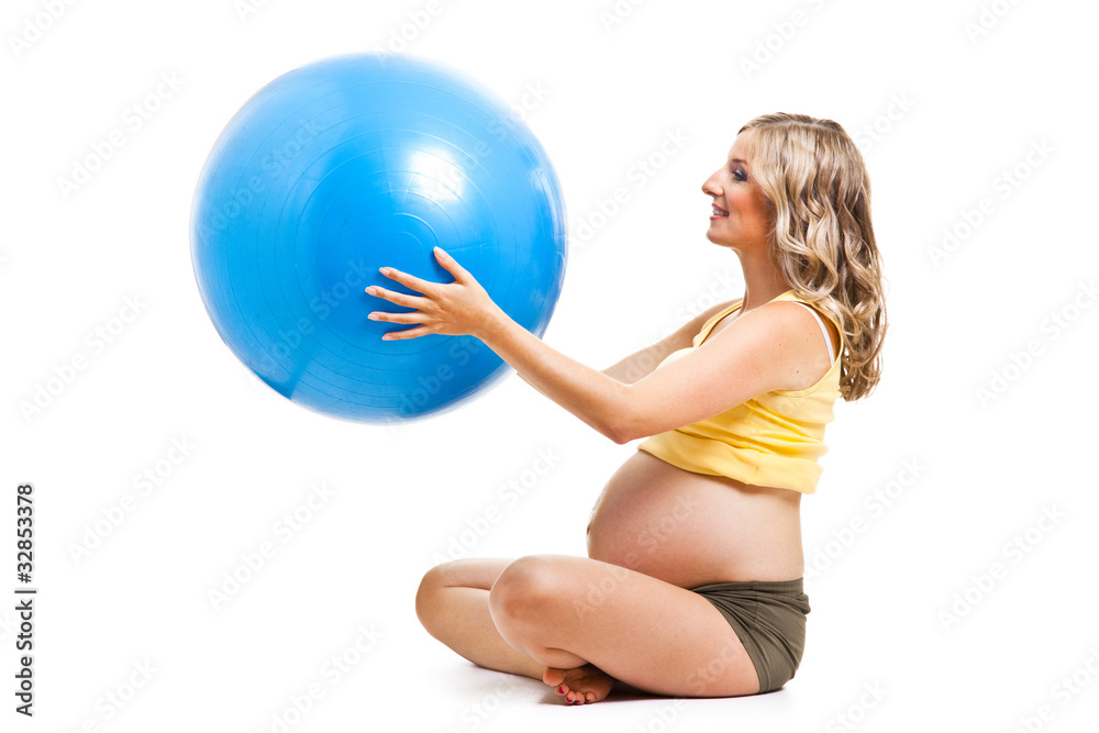Pregnant woman with gymnastic ball isolated on white Pregnant woman with gymnastic ball isolated on white