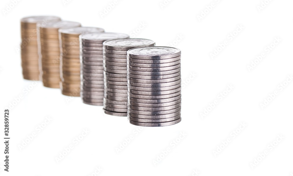 Silver and golden coins stacks on white Silver and golden coins stacks on white