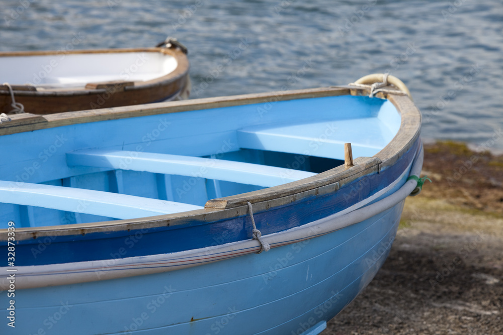 rowboat docked rowboat docked