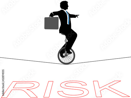 Business man unicycle tightrope over financial risk