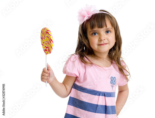 little girl with candy in studio isolated