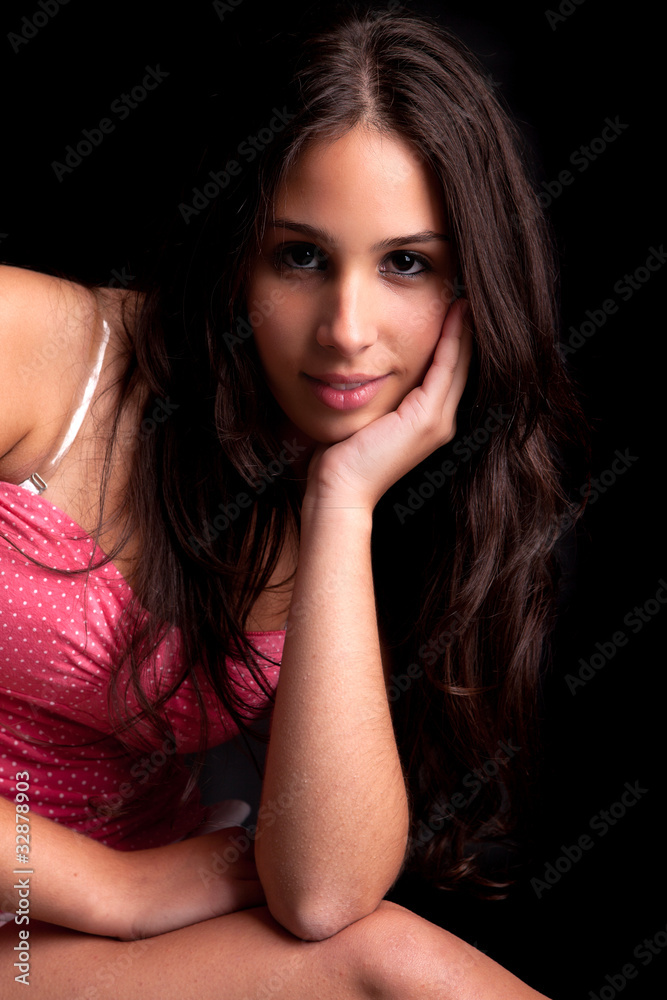 Beautiful woman sitting on a chair Beautiful woman sitting on a chair
