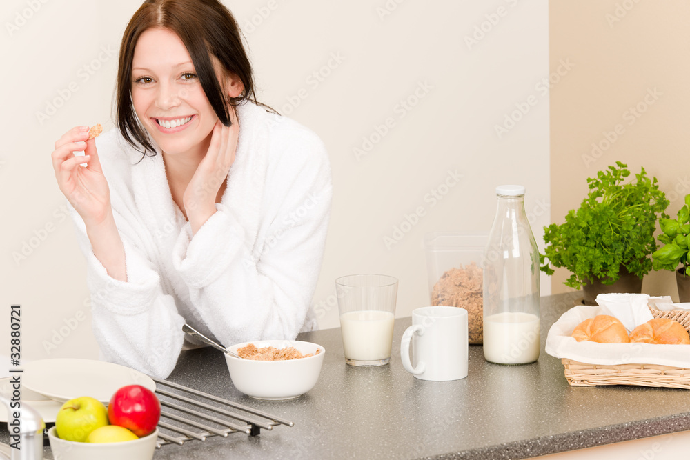Young student girl eat cereal in kitchen Young student girl eat cereal in kitchen