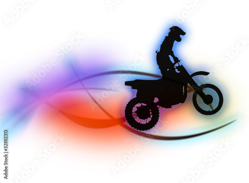 Silhouette of a man on a motorcycle