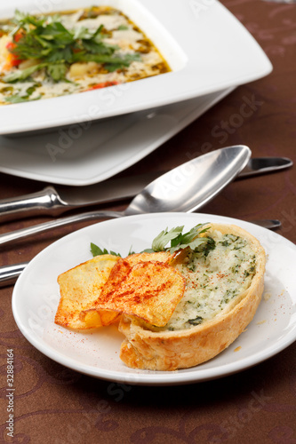 fish soup with potato chips and fish pie