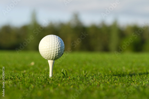Golf ball on the tee - idyllic golf course of Adare