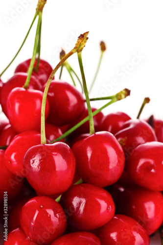 many cherries isolated on white background