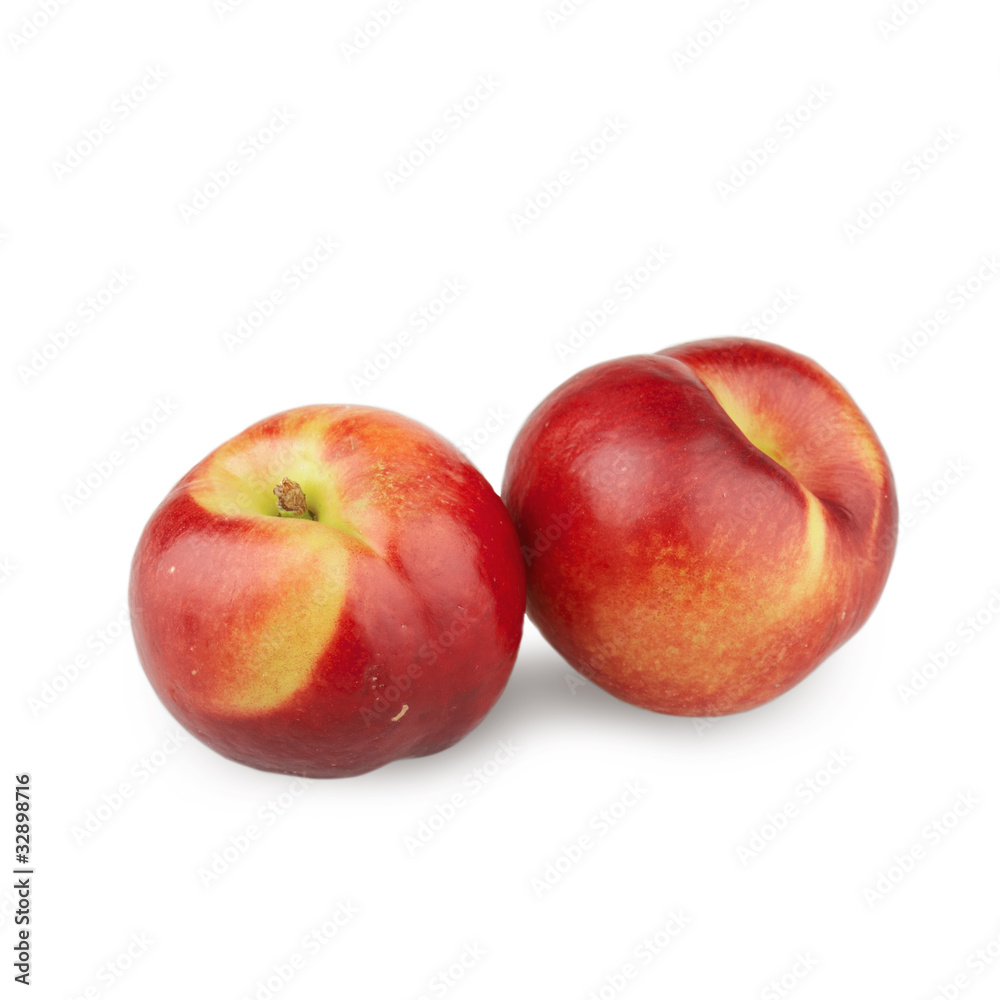 Juicy nectarines on a white background