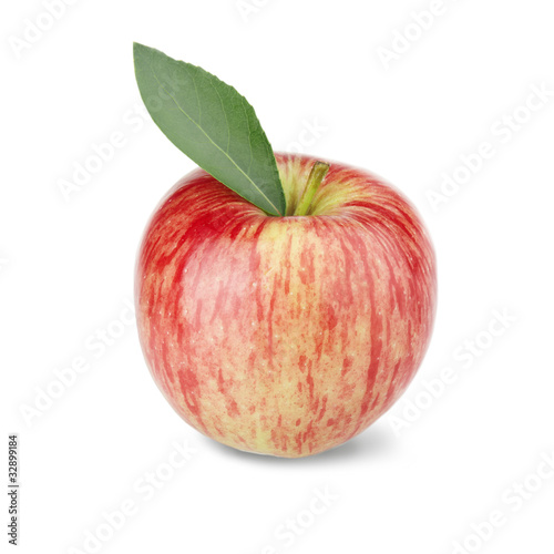 Ripe red apple with a leaf on a white background