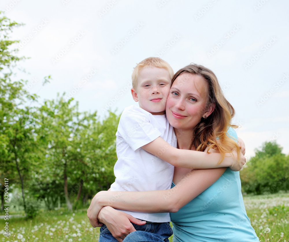 Fototapeta premium mother with her son outdoors