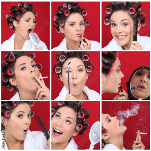 Expressive woman with hair curlers on red background photo