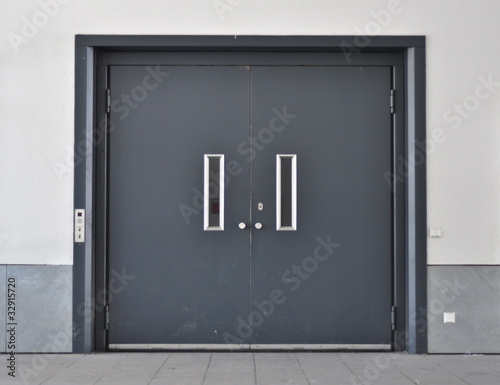 dark gray double metal door