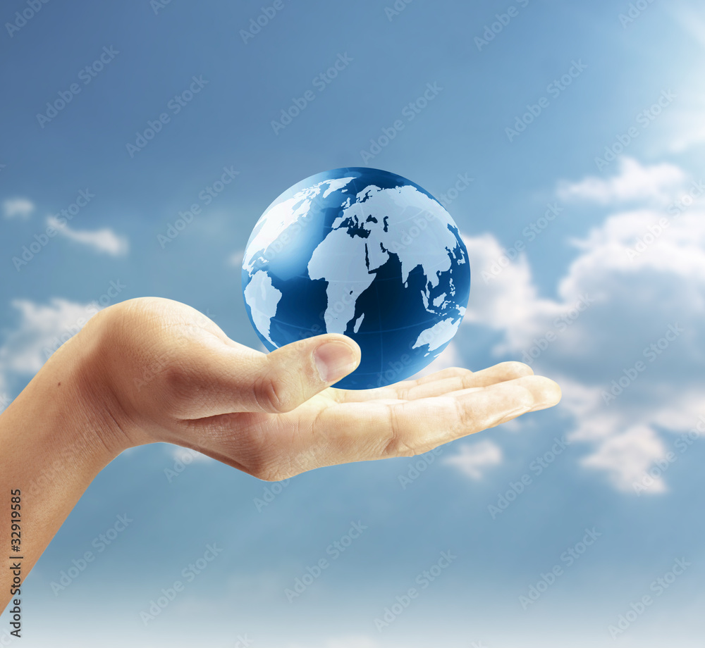 holding a glowing earth globe in his hands