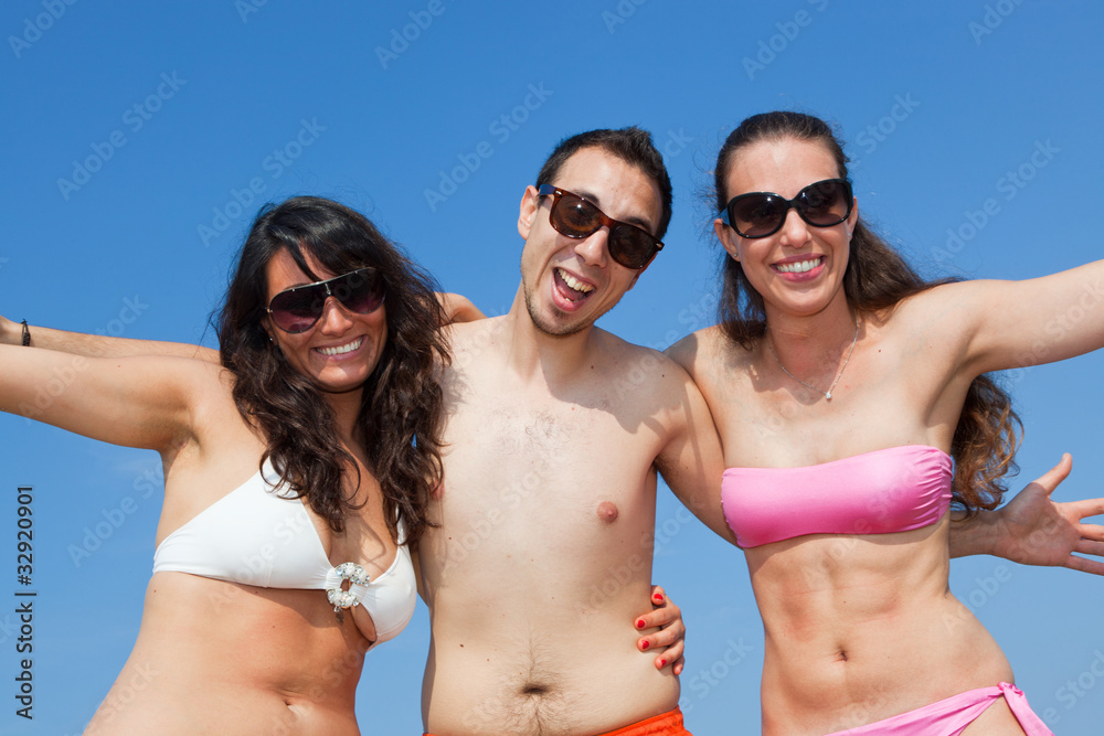 Happy Friends Embraced at Seaside Happy Friends Embraced at Seaside