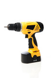 Yellow power drill isolated against white