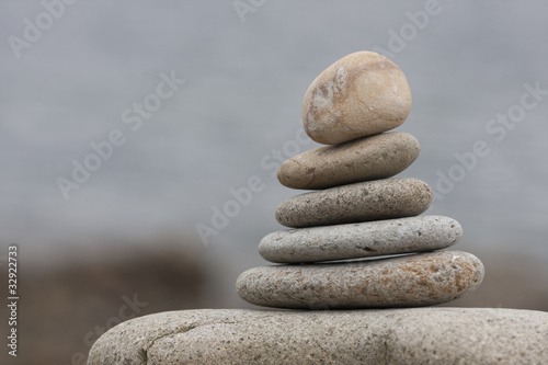 Photography many round stones on tower