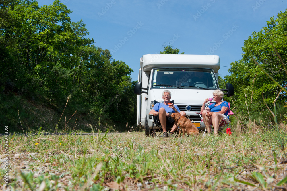 Couple is traveling by camping car