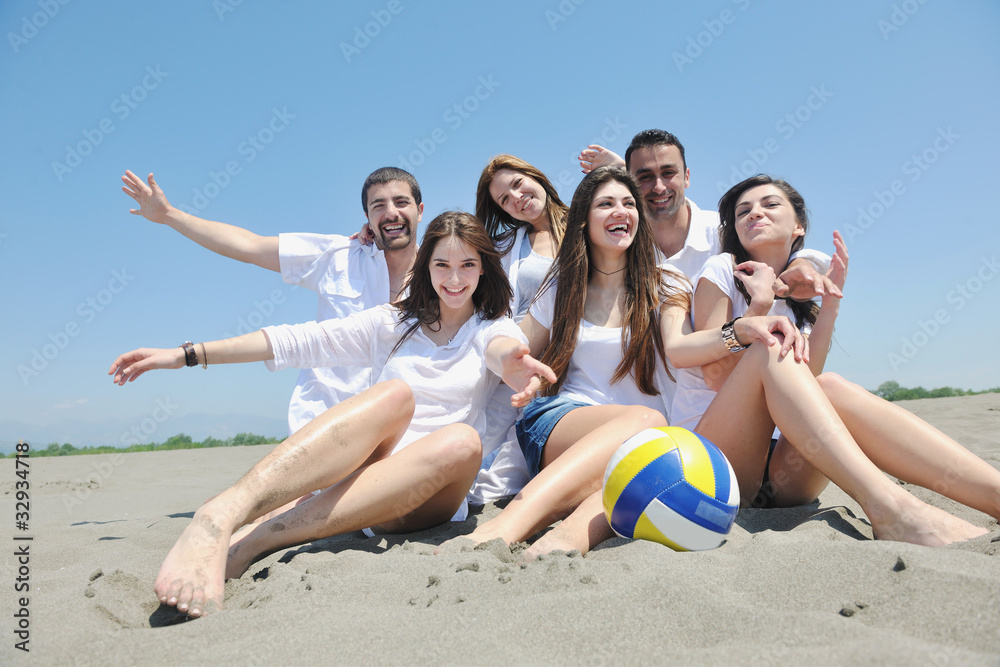 happy young people group have fun on beach happy young people group have fun on beach