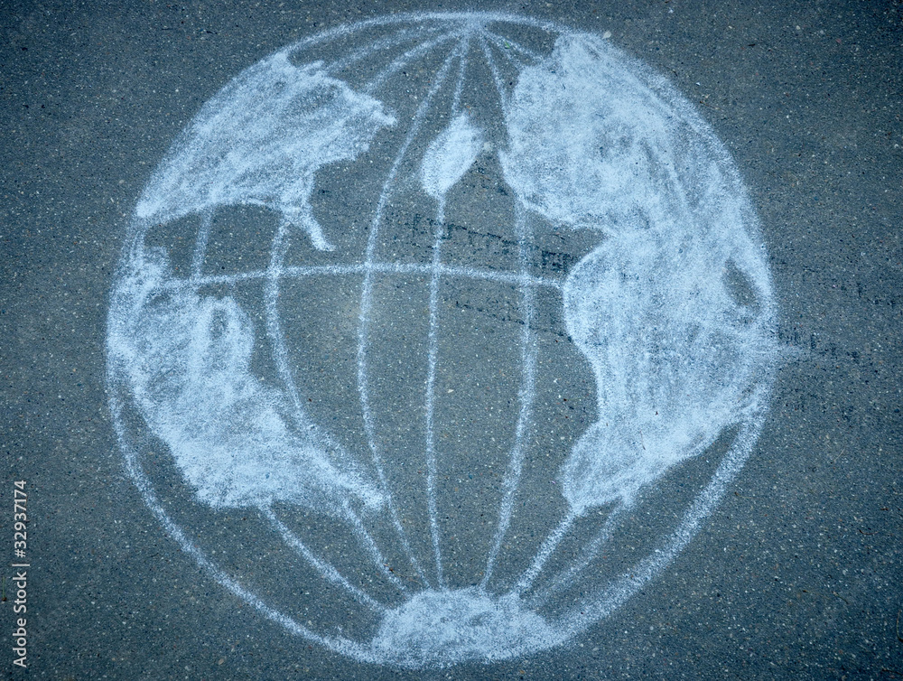 globe drawn with chalk on the asphalt