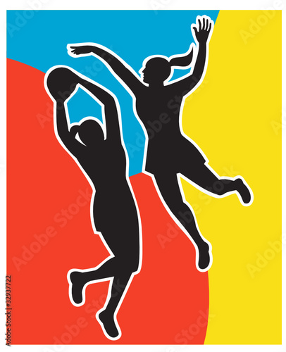 Netball player shooting ball
