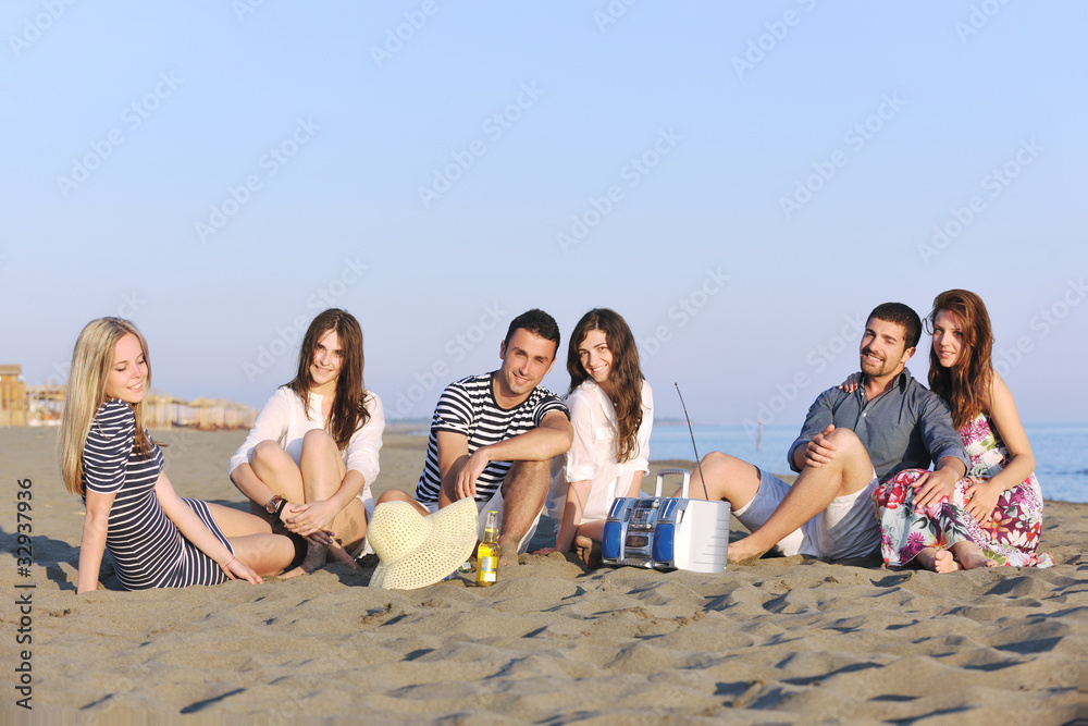 happy young people group have fun on beach happy young people group have fun on beach