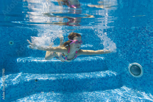 Underwater kid in swimming pool