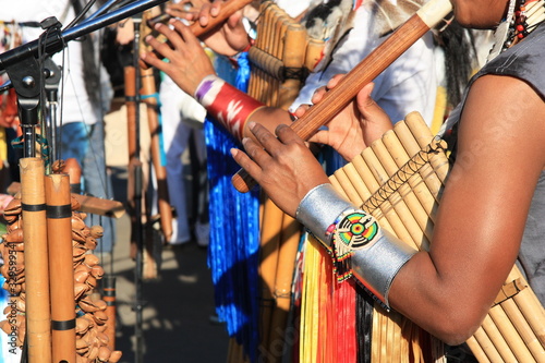 Native South American tribal group from Ecuador play music photo