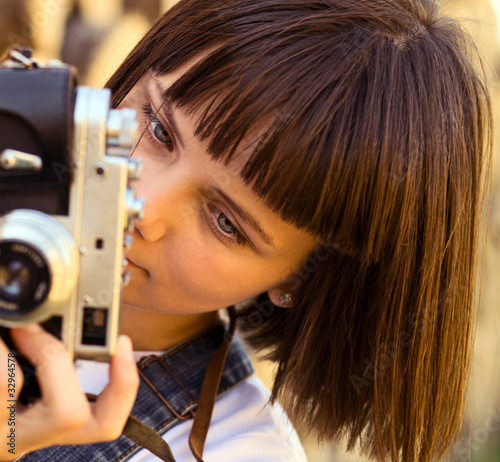 girl with old camera.