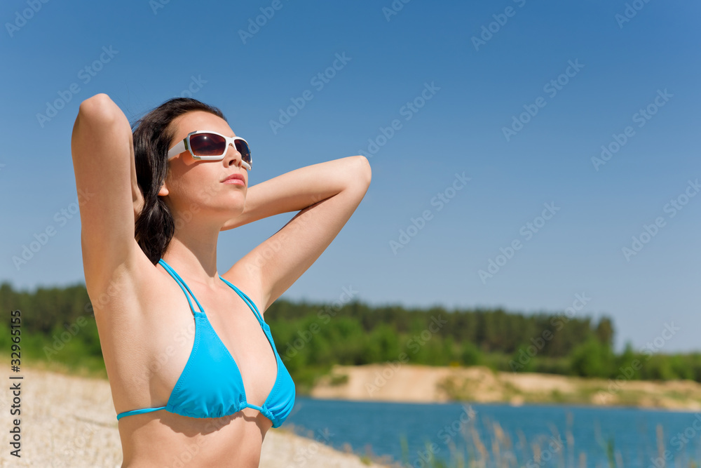 Summer beach woman in blue bikini bra Summer beach woman in blue bikini bra