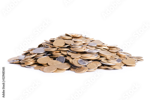 Heap of ukrainian coins isolated on white background