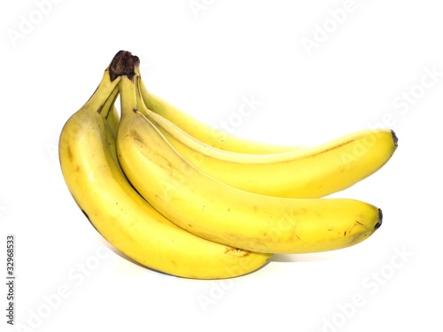 Fresh bananas on a white background