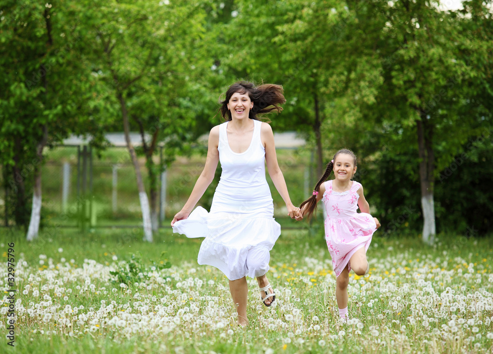 Fototapeta premium Young mother and her young daughter