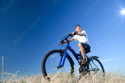 The boy with a bicycle