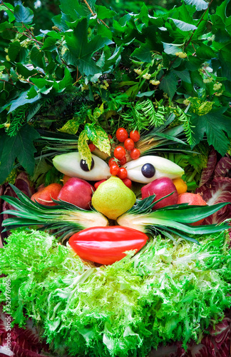 Human face of vegetables and fruits, in the manner of Arcimboldi