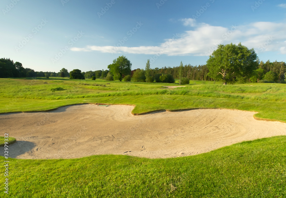 Idyllic golf course with sand banks