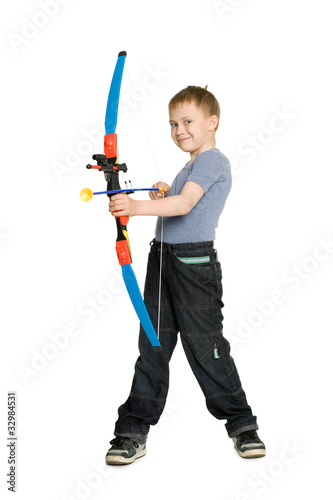 Smiling boy with a bow for kids.